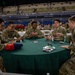Mississippi National Guard Soldier play a card game during a holiday luncheon