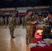 U.S. National Guard service members receive food during a holiday luncheon