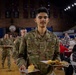 A Mississippi Army National Guard Soldier prepares to eat during a holiday luncheon