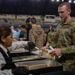 A Mississippi Army National Guard Soldier receives food during a holiday luncheon in Washington, D.C.