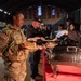 A Mississippi Army National Guard Soldier receives food during a holiday luncheon