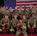 Mississippi National Guard service members take a picture together during a holiday luncheon