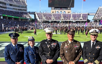Coast Guard performs an oath of enlistment during the Armed Forces Bowl