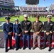 Coast Guard performs an oath of enlistment during the Armed Forces Bowl