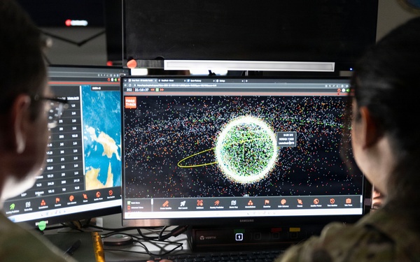 Space Force Guardians assigned to Space Delta 5 monitor a computer workstation.