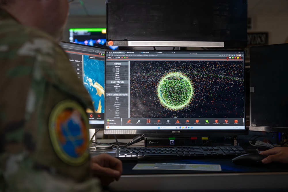 A U.S. Space Force Guardian assigned to Space Delta 5 monitors a computer workstation.