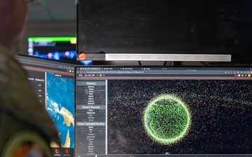 A U.S. Space Force Guardian assigned to Space Delta 5 monitors a computer workstation.