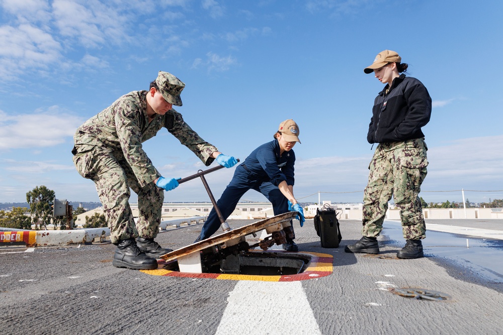 USS Theodore Roosevelt Sailors Conduct Maintenance