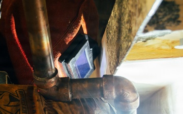 Ronald Reagan Sailors and PSNS Contractors Conduct Maintenance