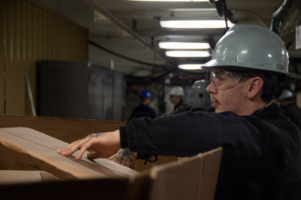 Ronald Reagan Sailors and PSNS Contractors Conduct Maintenance