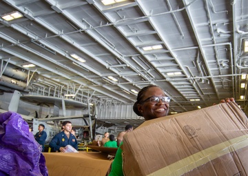 Abraham Lincoln conducts a replenishment-at-sea with Henry J. Kaiser