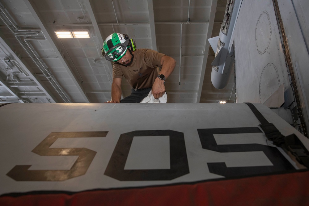 Abraham Lincoln conducts routine aircraft maintenance