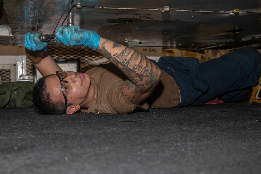 Abraham Lincoln conducts routine maintenance