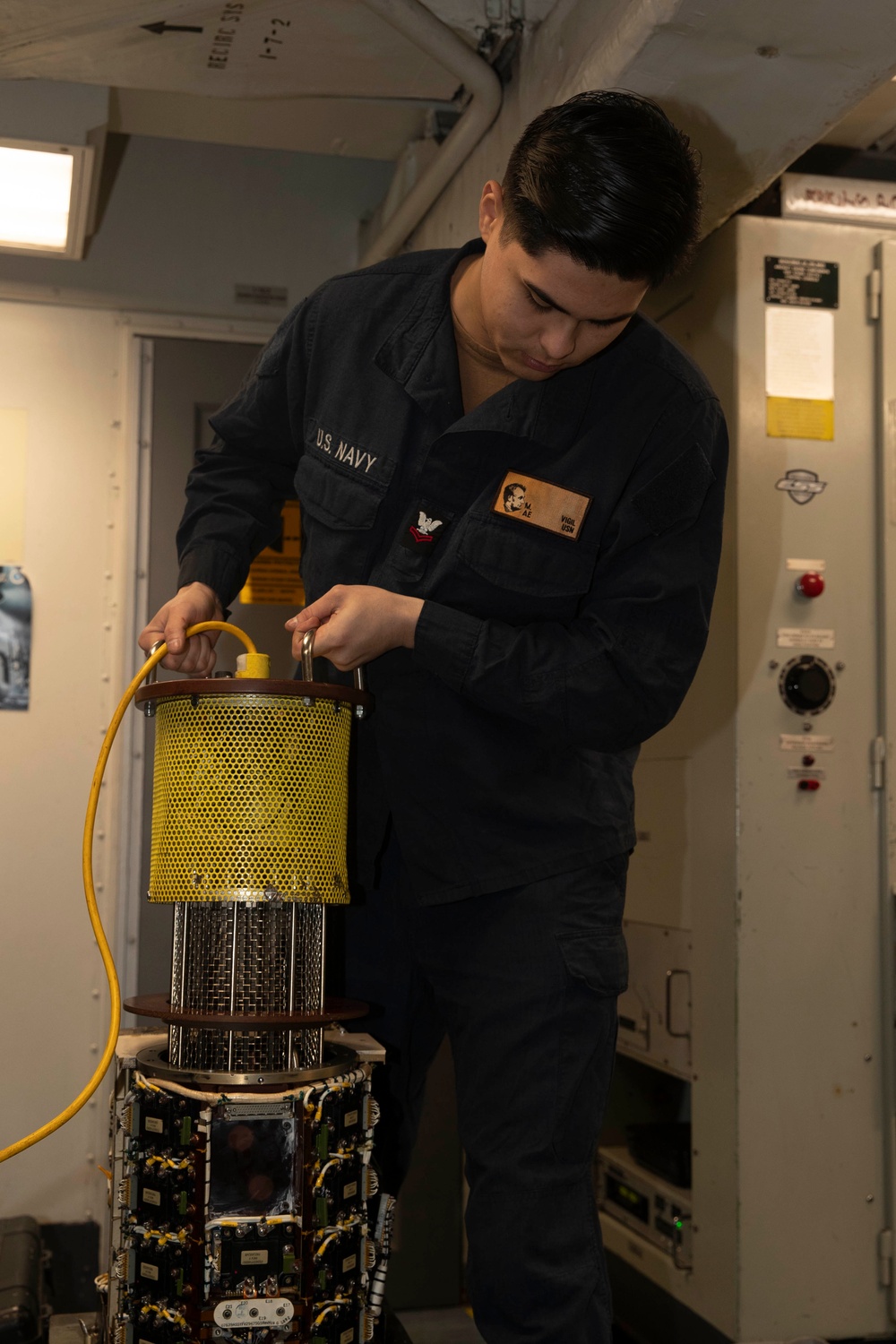 Abraham Lincoln conducts routine maintenance