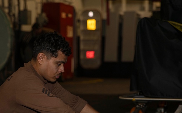 Abraham Lincoln conducts routine aircraft maintenance