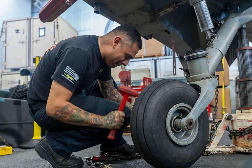 Abraham Lincoln conducts routine aircraft maintenance