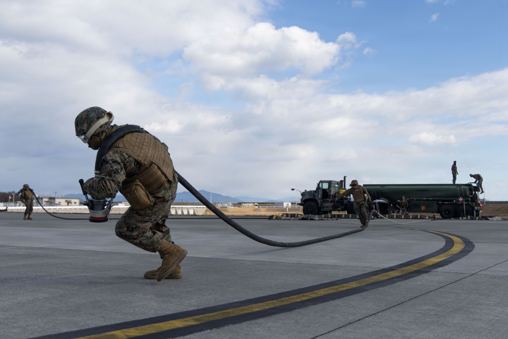 U.S. Marines perform ordnance loading and refueling