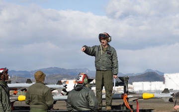 U.S. Marines perform ordnance loading and refueling