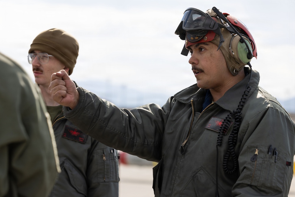 U.S. Marines perform ordnance loading and refueling