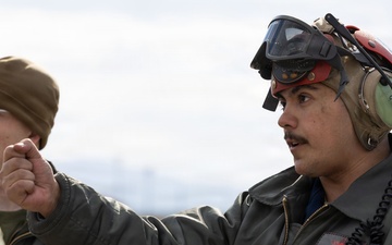 U.S. Marines perform ordnance loading and refueling