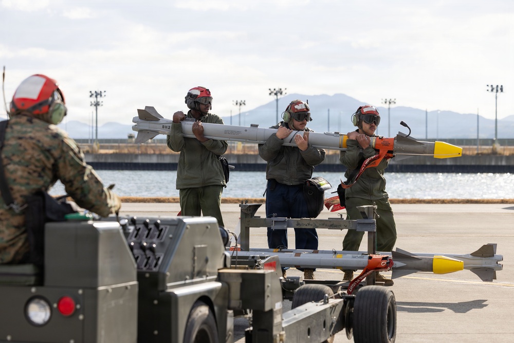 U.S. Marines perform ordnance loading and refueling
