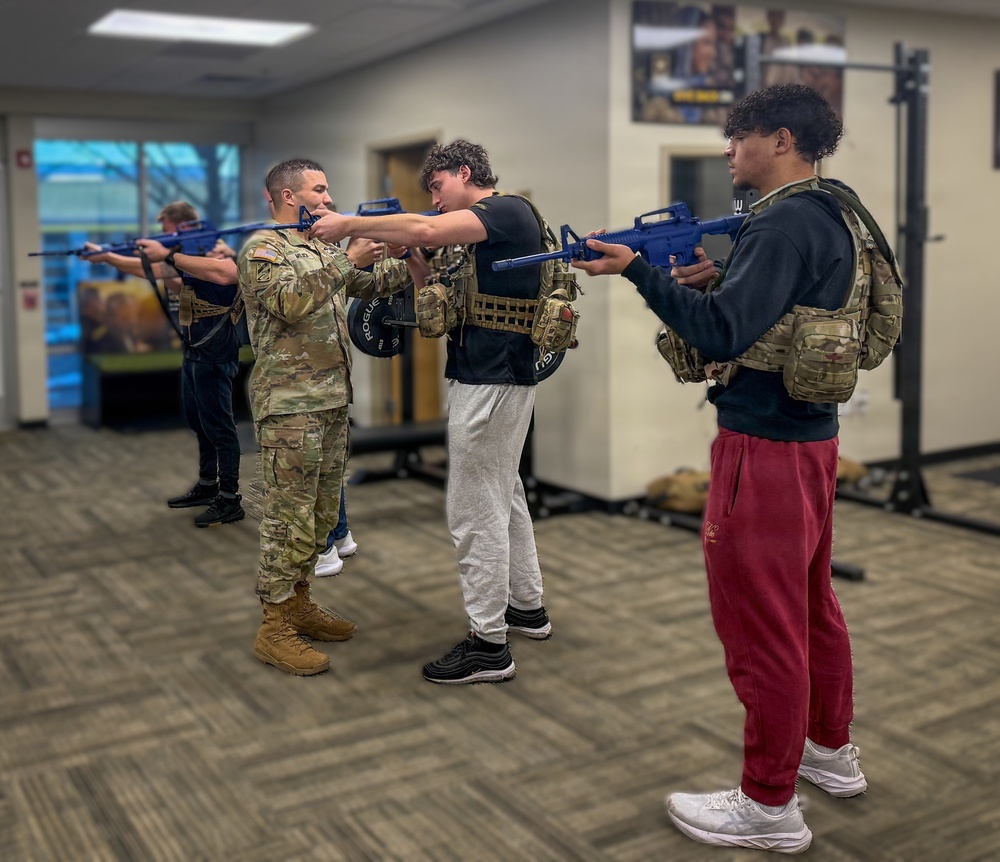 Sgt. 1st Class Joseph Mojica conducts weapons training
