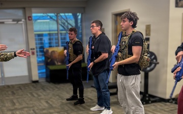 Sgt. 1st Class Joseph Mojica instructs Future Soldiers on weapon handling
