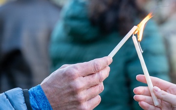 Team Travis celebrates Hanukkah with menorah lighting ceremony