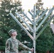 Team Travis celebrates Hanukkah with menorah lighting ceremony