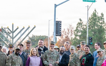 Team Travis celebrates Hanukkah with menorah lighting ceremony