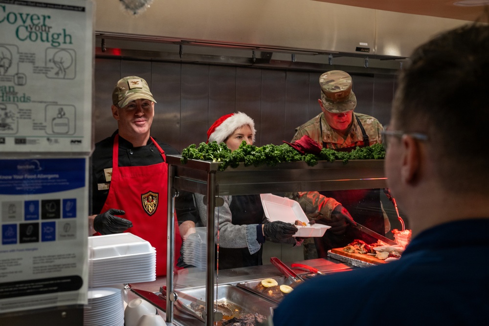 Team Osan leadership serves Christmas meals at DFAC