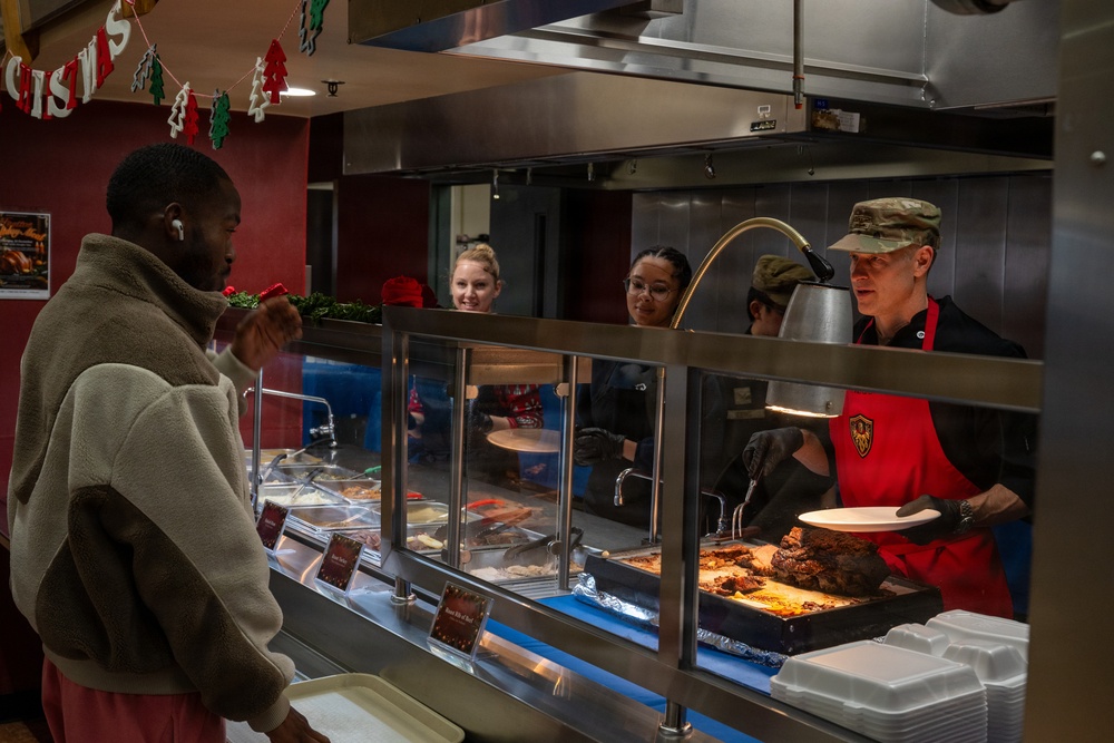 Team Osan leadership serves Christmas meals at DFAC