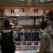 Team Osan leadership serves Christmas meals at DFAC