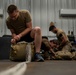 82nd ERQS Airman prepares parachutes for regional operations