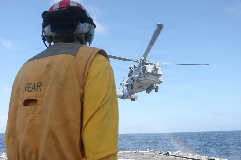 Coast Guard Cutter Bear, U.S. Navy aircrews conduct vertical replenishment operations in the Caribbean Sea