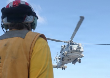 Coast Guard Cutter Bear, U.S. Navy aircrews conduct vertical replenishment operations in the Caribbean Sea