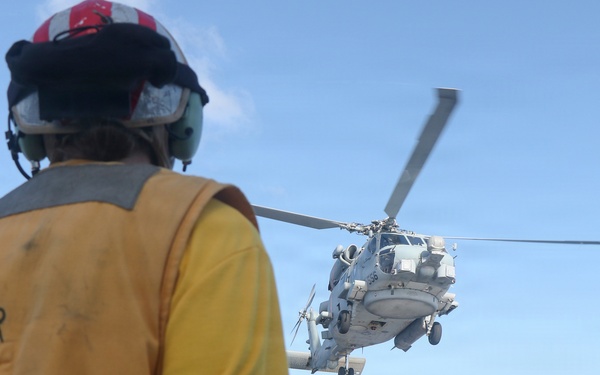 Coast Guard Cutter Bear, U.S. Navy aircrews conduct vertical replenishment operations in the Caribbean Sea
