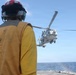 Coast Guard Cutter Bear, U.S. Navy aircrews conduct vertical replenishment operations in the Caribbean Sea