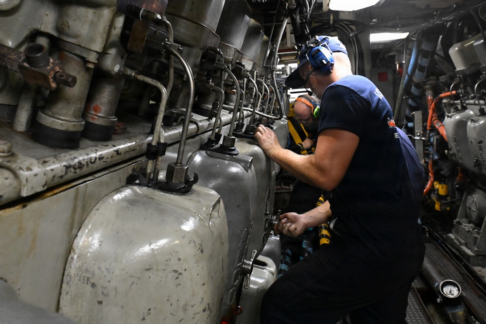 USCGC Polar Star (WAGB 10) main propulsion crew members conduct maintenance during Operation Deep Freeze 2026