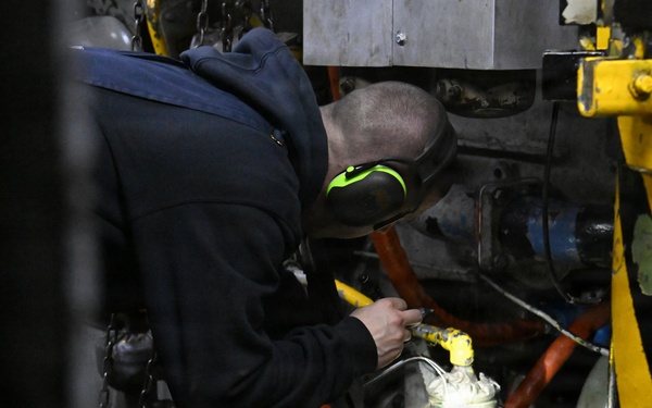 USCGC Polar Star (WAGB 10) main propulsion crew members conduct maintenance during Operation Deep Freeze 2026