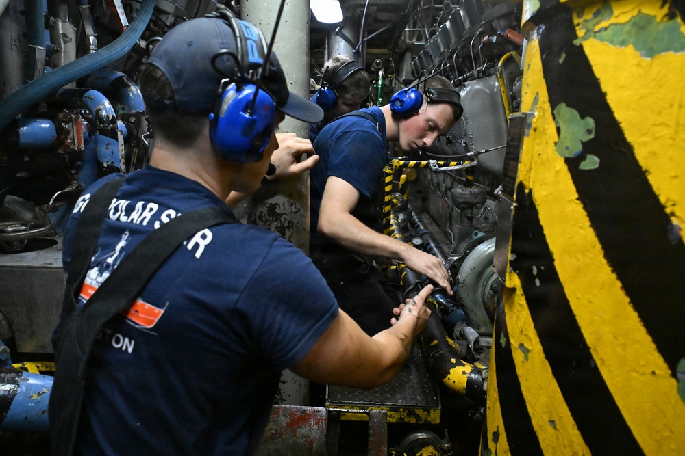 USCGC Polar Star (WAGB 10) main propulsion crew members conduct maintenance during Operation Deep Freeze 2026