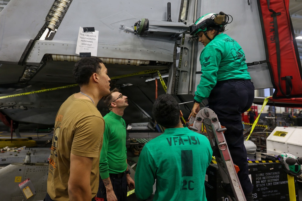 Abraham Lincoln conducts routine aircraft maintenance