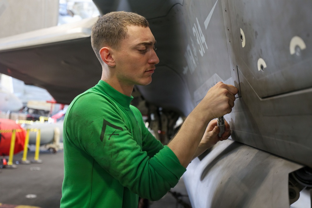 Abraham Lincoln conducts routine aircraft maintenance
