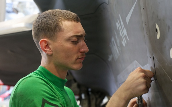 Abraham Lincoln conducts routine aircraft maintenance