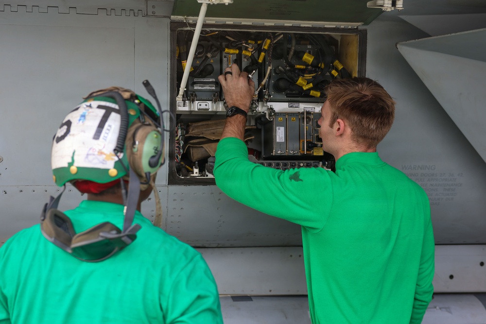 Abraham Lincoln conducts routine aircraft maintenance