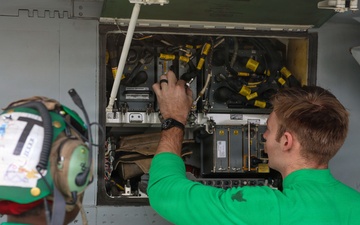 Abraham Lincoln conducts routine aircraft maintenance