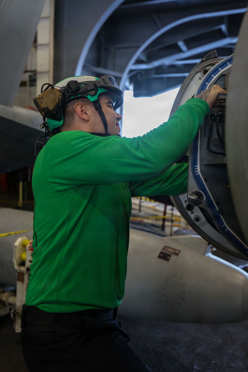 Abraham Lincoln conducts routine aircraft maintenance