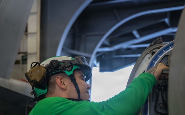 Abraham Lincoln conducts routine aircraft maintenance