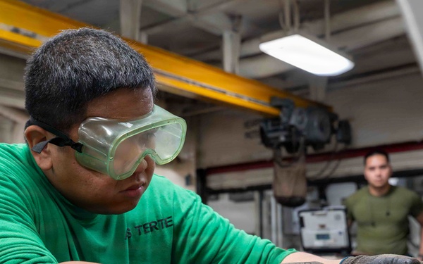 Abraham Lincoln conducts routine maintenance