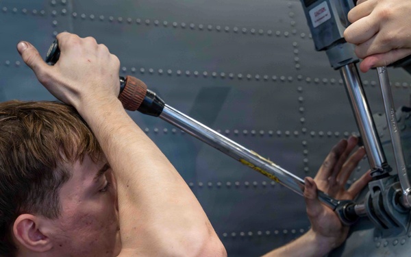 Abraham Lincoln conducts routine aircraft maintenance